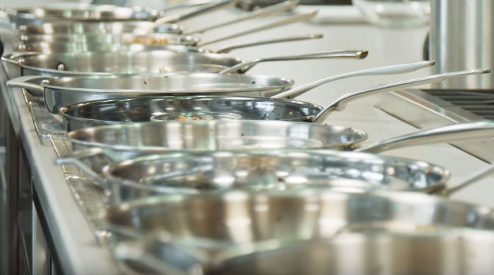 multiple stainless steel pans